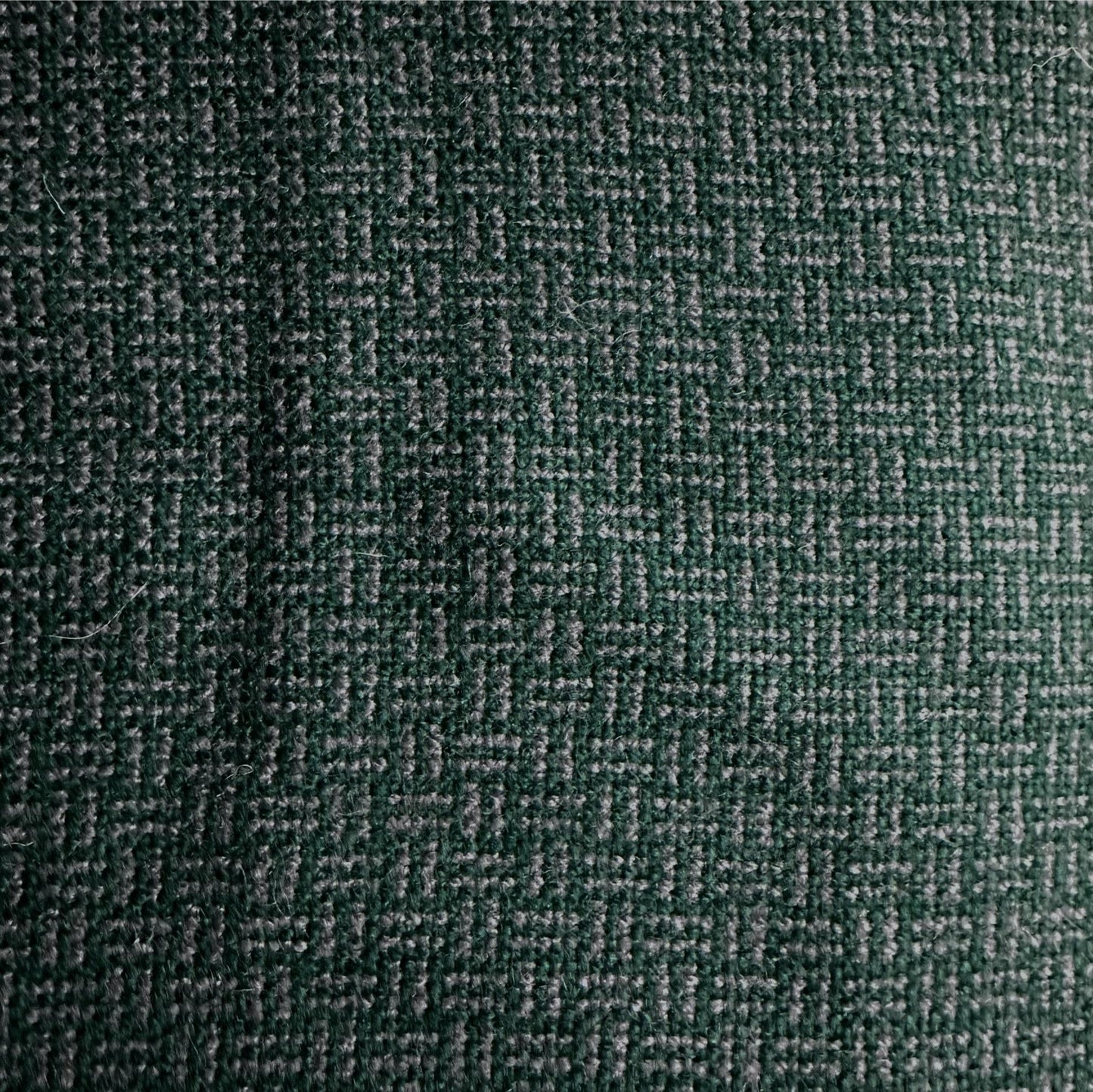 Green 100% wool fabric with labyrinth pattern for clothing and upholstery