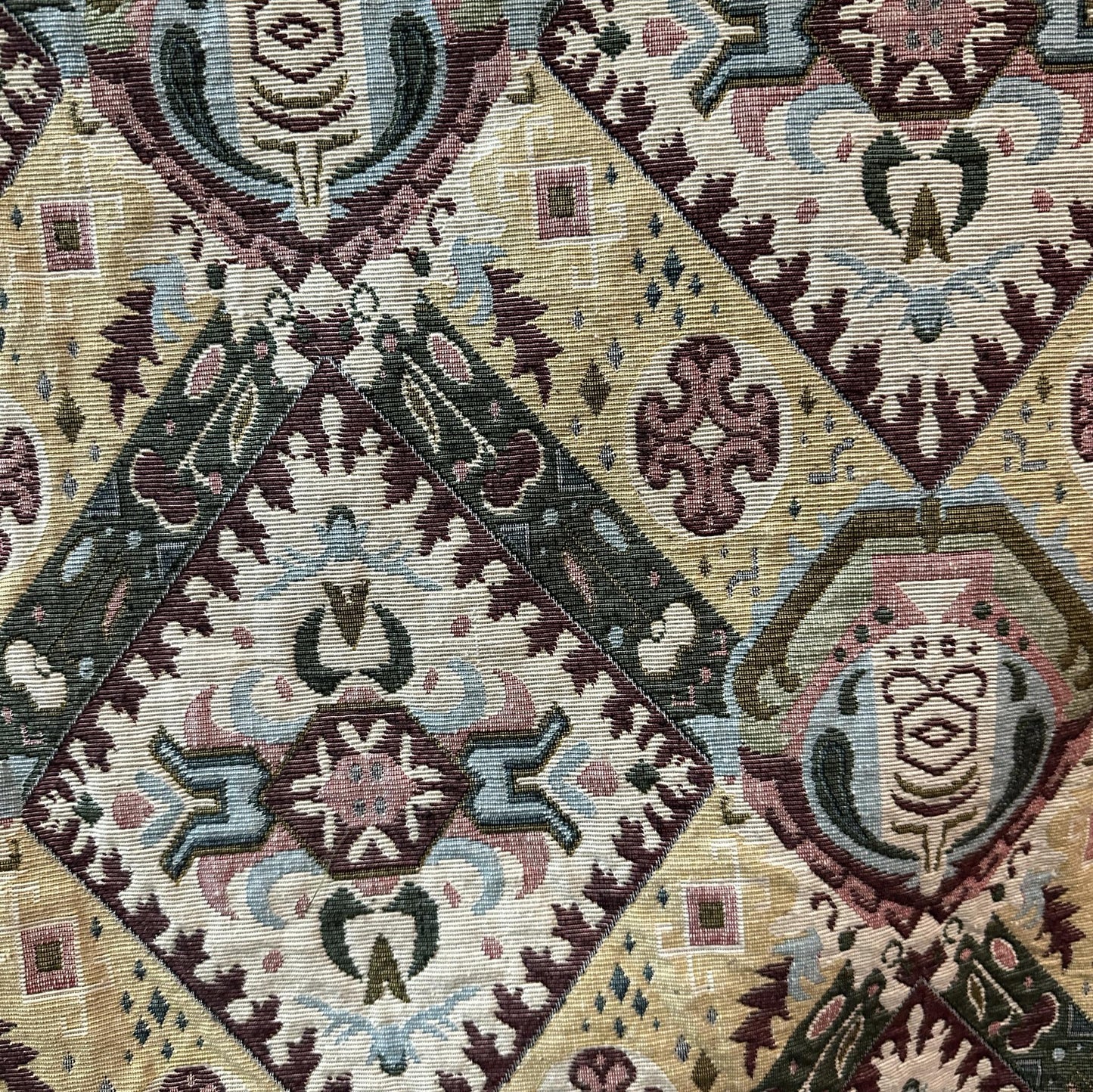 Multicolour tapestry upholstery fabric with geometric medallions, diamonds and ornamental woven motifs