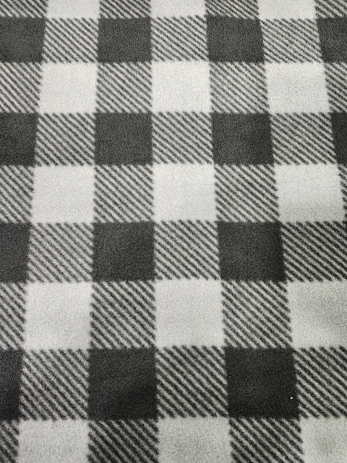 Plaid checkered polyester plaid fleece fabric with a soft brushed finish for blankets, apparel, and crafts