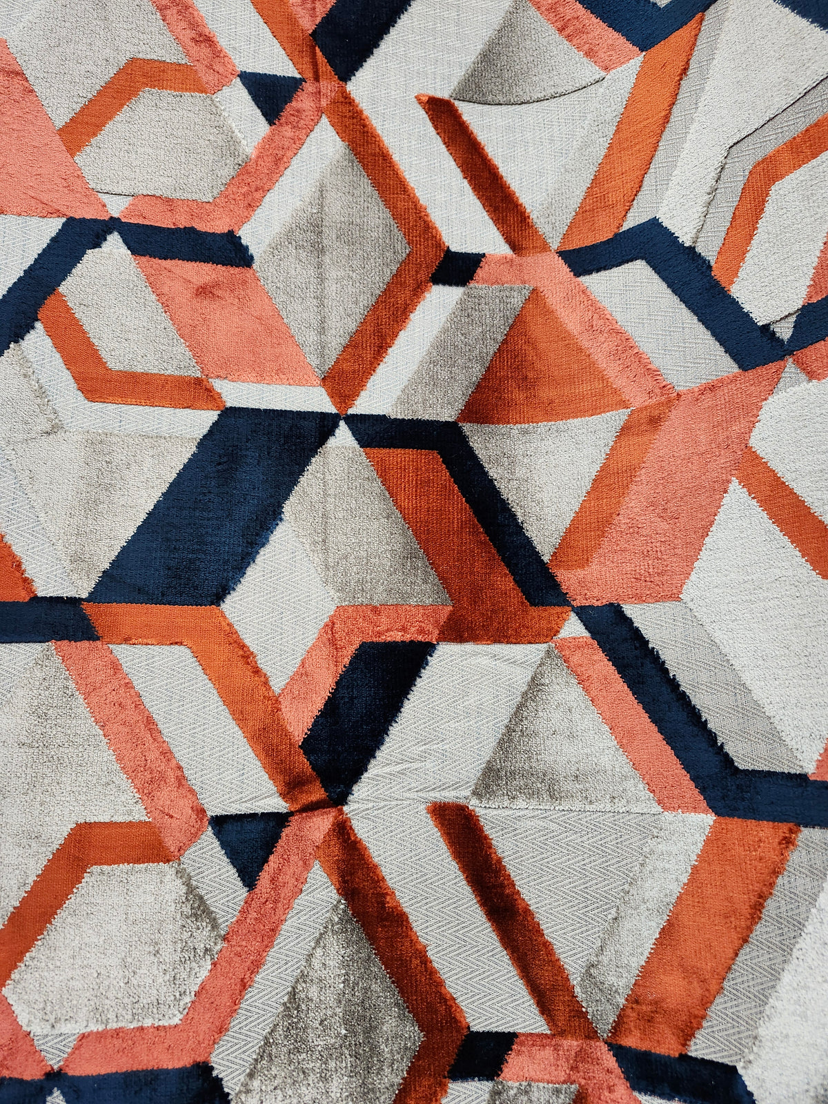 Blue, grey and orange upholstery velvet fabric with a soft plush finish