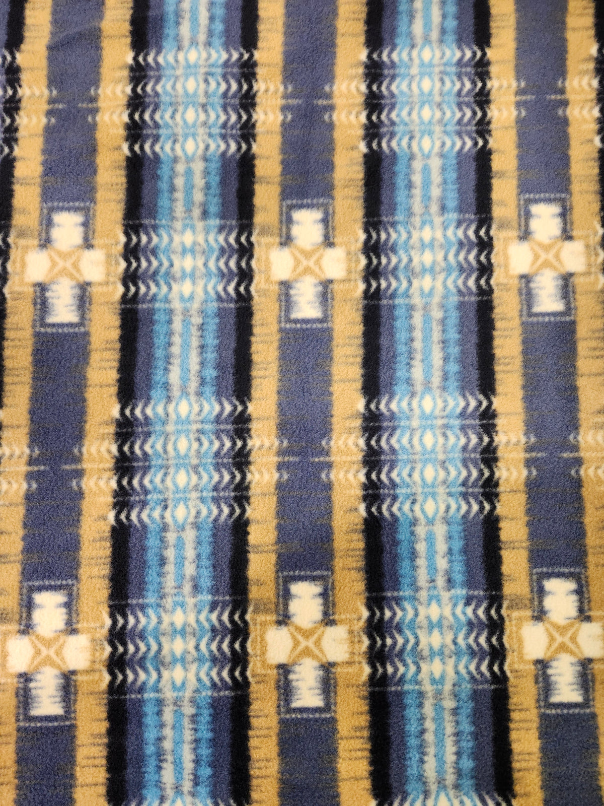 Soft Geometric polyester fleece fabric with a plush brushed texture for blankets, apparel, and crafts