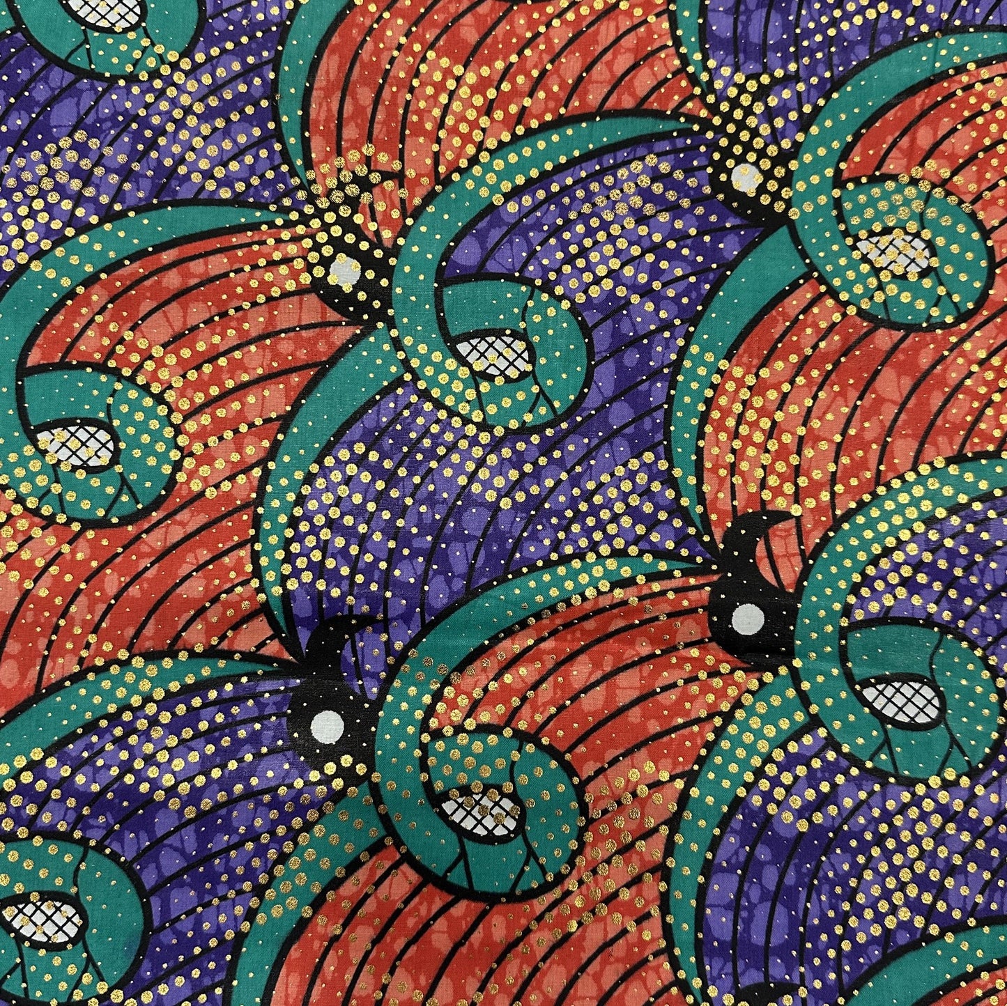 African wax cotton fabric with a colourful repeating curves pattern