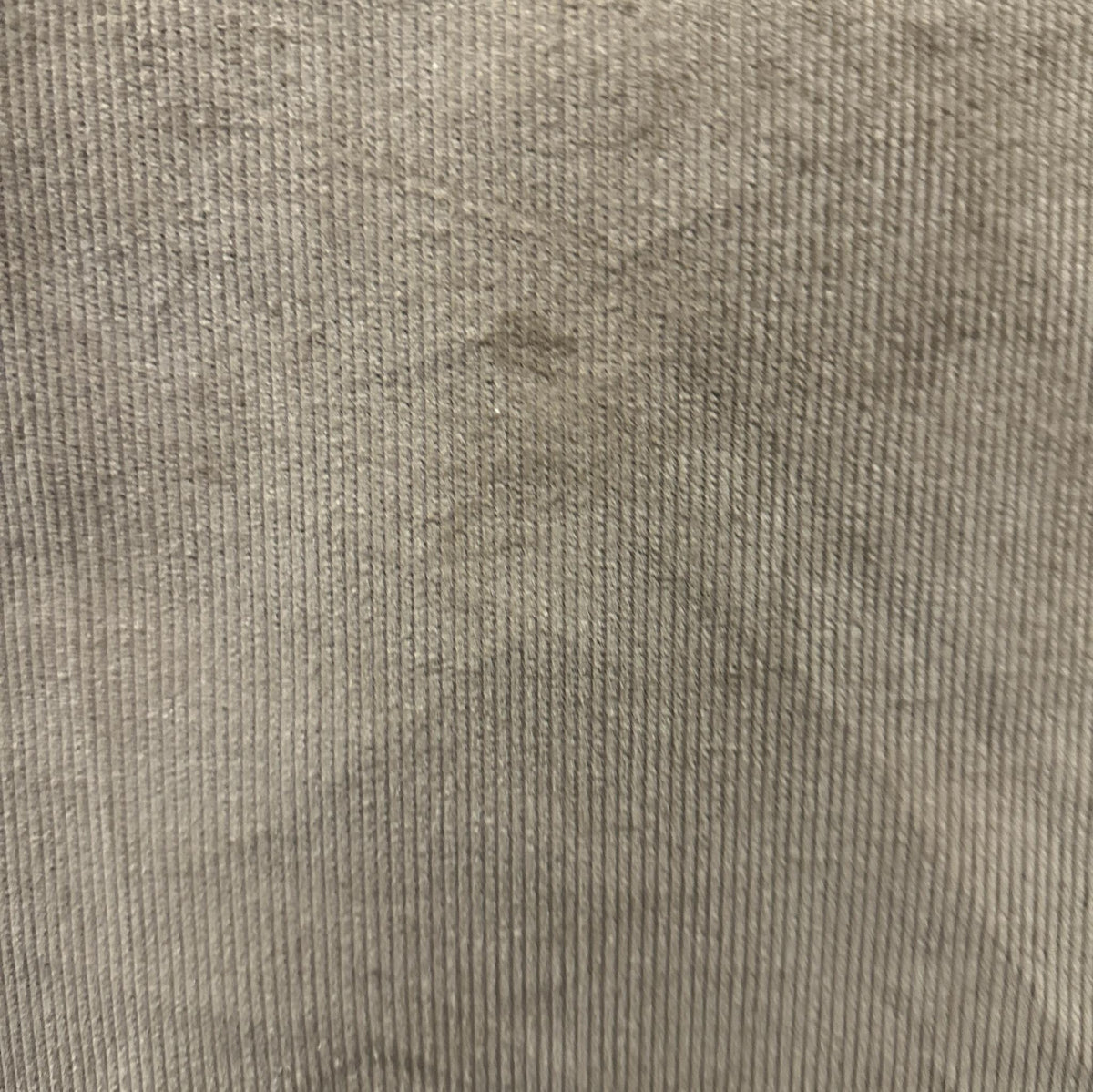 Beige velvet upholstery fabric with a soft ribbed corduroy look-a-like texture