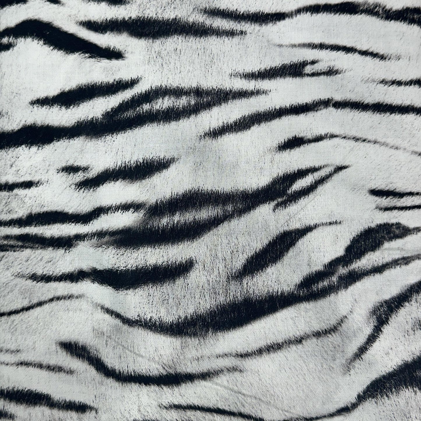 White and black 100% cotton fabric with zebra skin print stripes for quilting and sewing