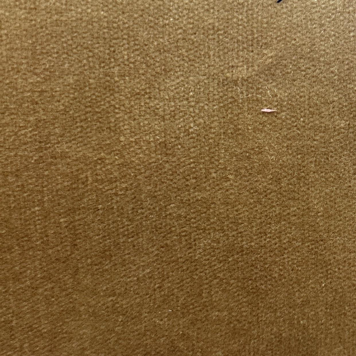 Brown velvet upholstery fabric with a soft solid pile and subtle tonal texture