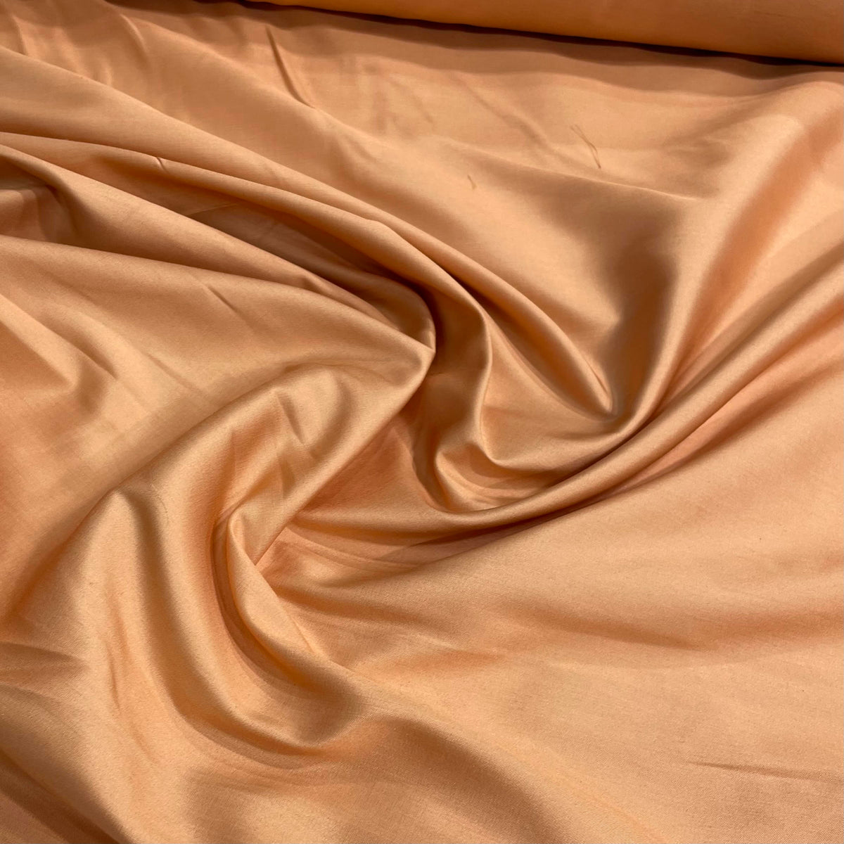 Extra-wide Italian silk fabric in apricot orange for apparel, curtains and home décor