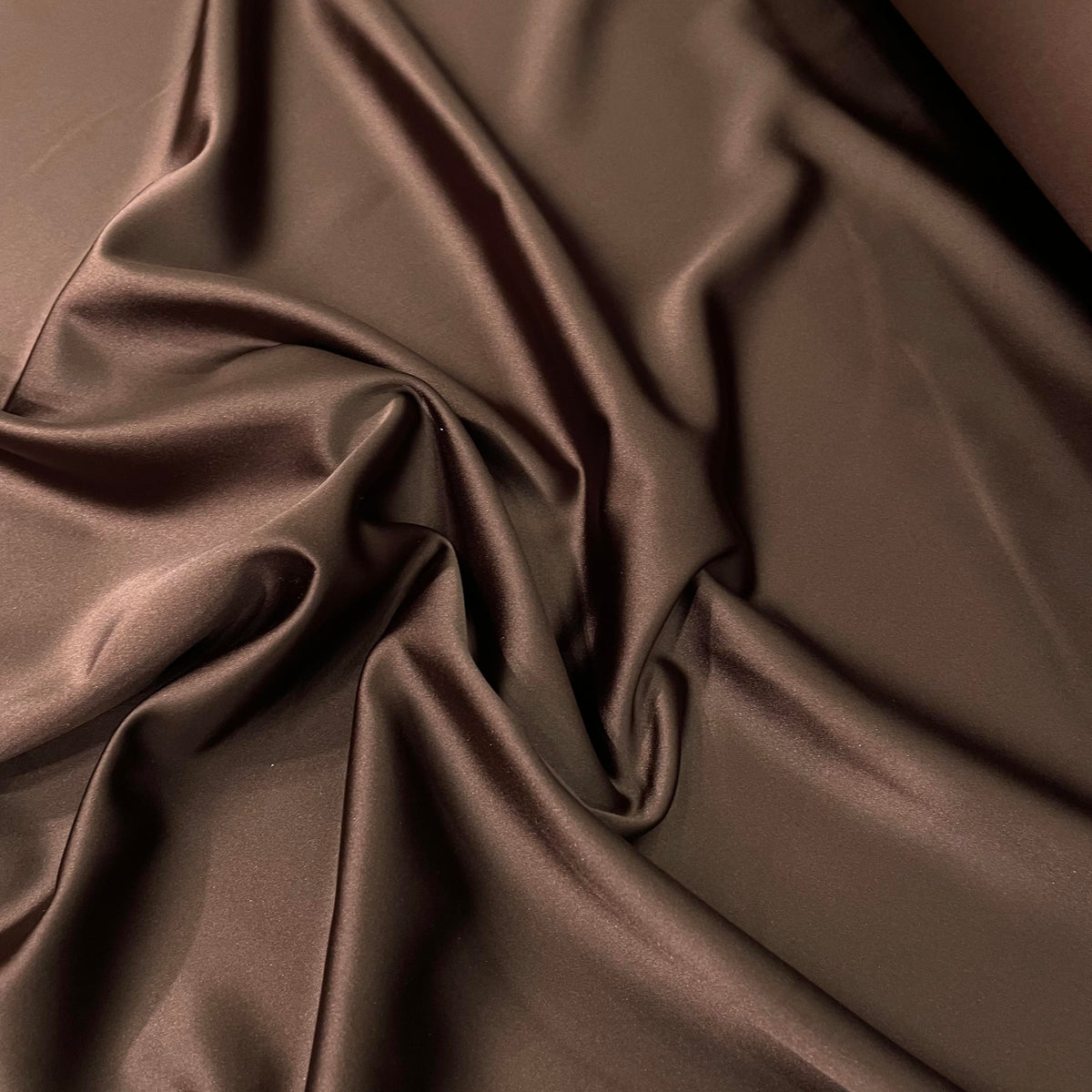 Dark brown polyester satin fabric with a smooth lustrous surface and rich solid colour