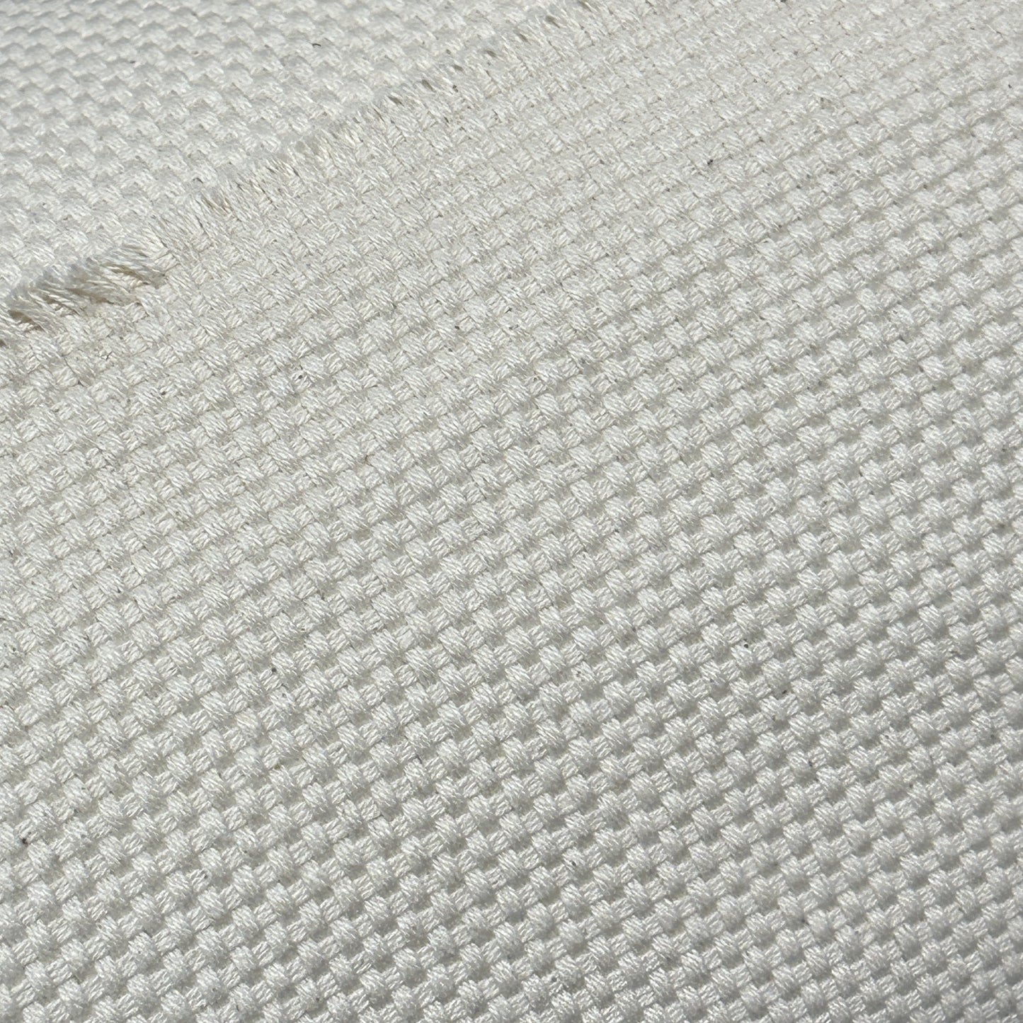 Natural beige cotton canvas matty fabric with textured woven surface