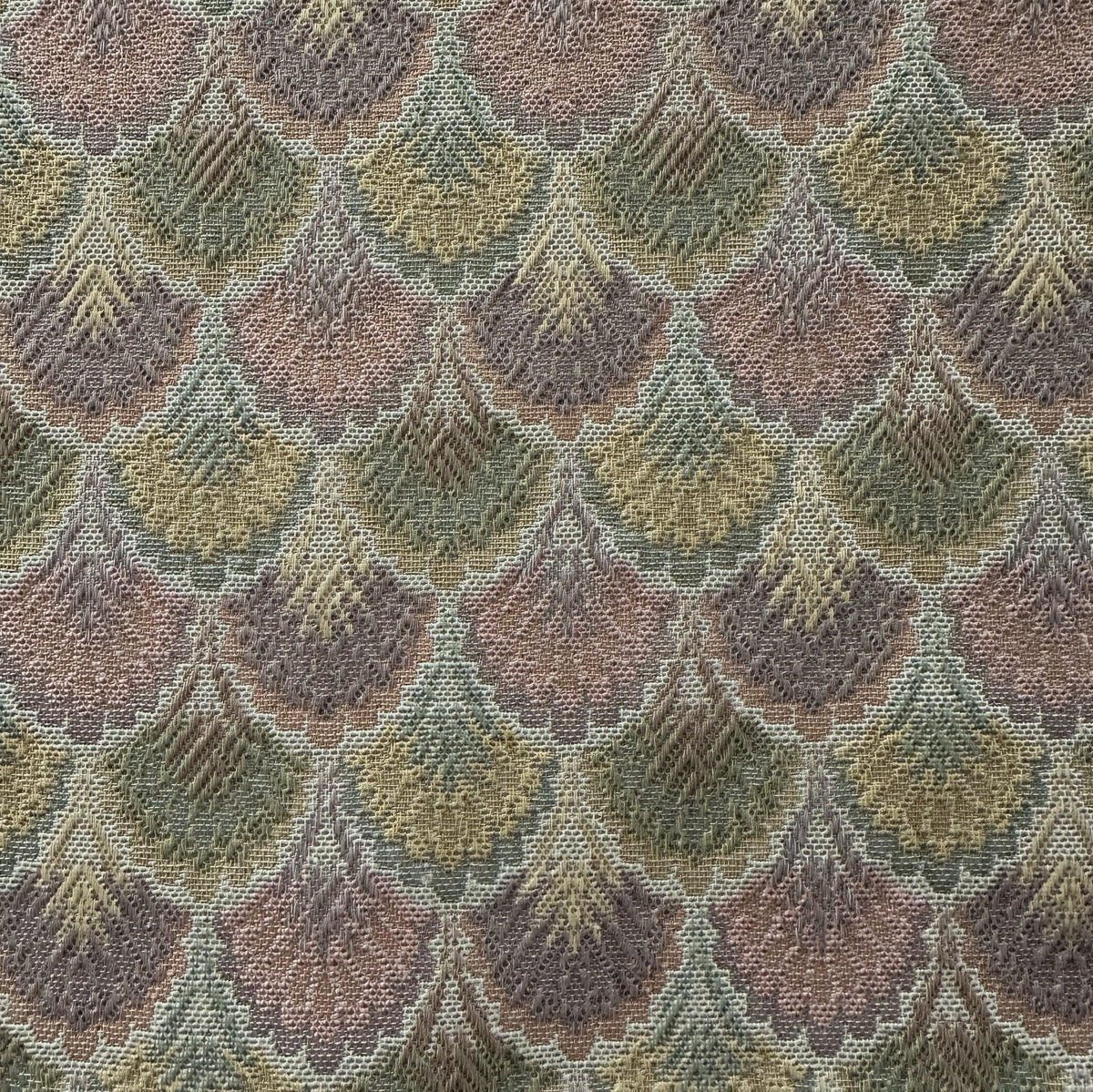 Multicolor polyester upholstery fabric with shellfish pattern in green, brown and beige