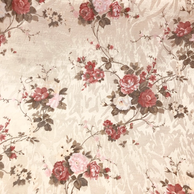Rust and beige polyester jacquard fabric with an ornate woven floral and nature-inspired pattern