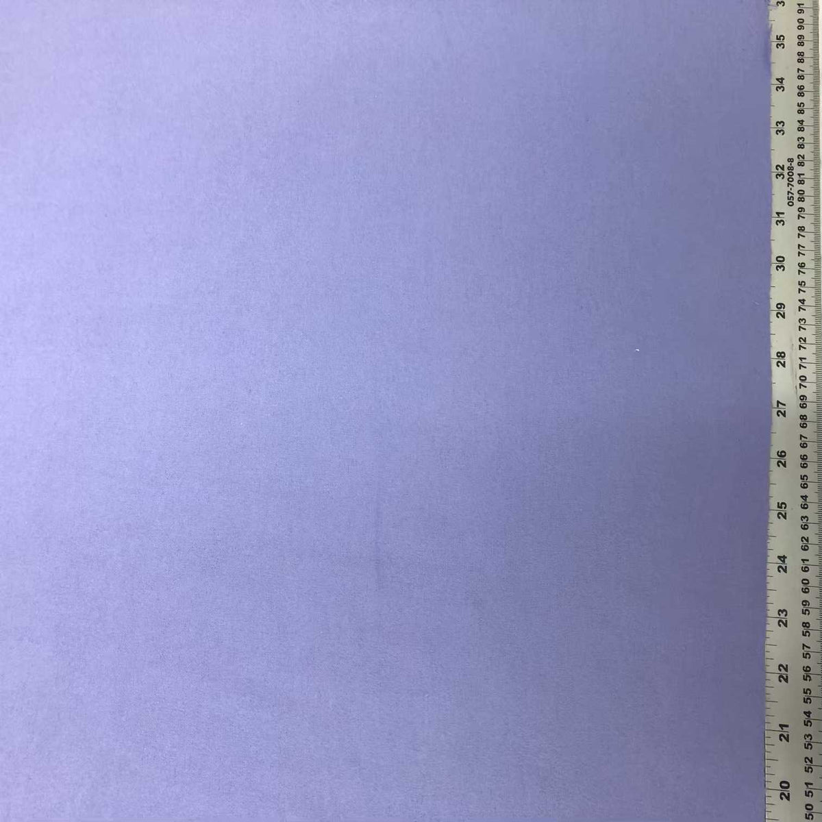 Solid purple cotton flannel fabric with a soft, smooth flannelette surface