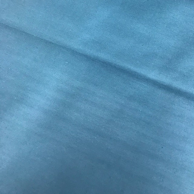 Solid Schooner blue cotton fabric with a smooth woven surface