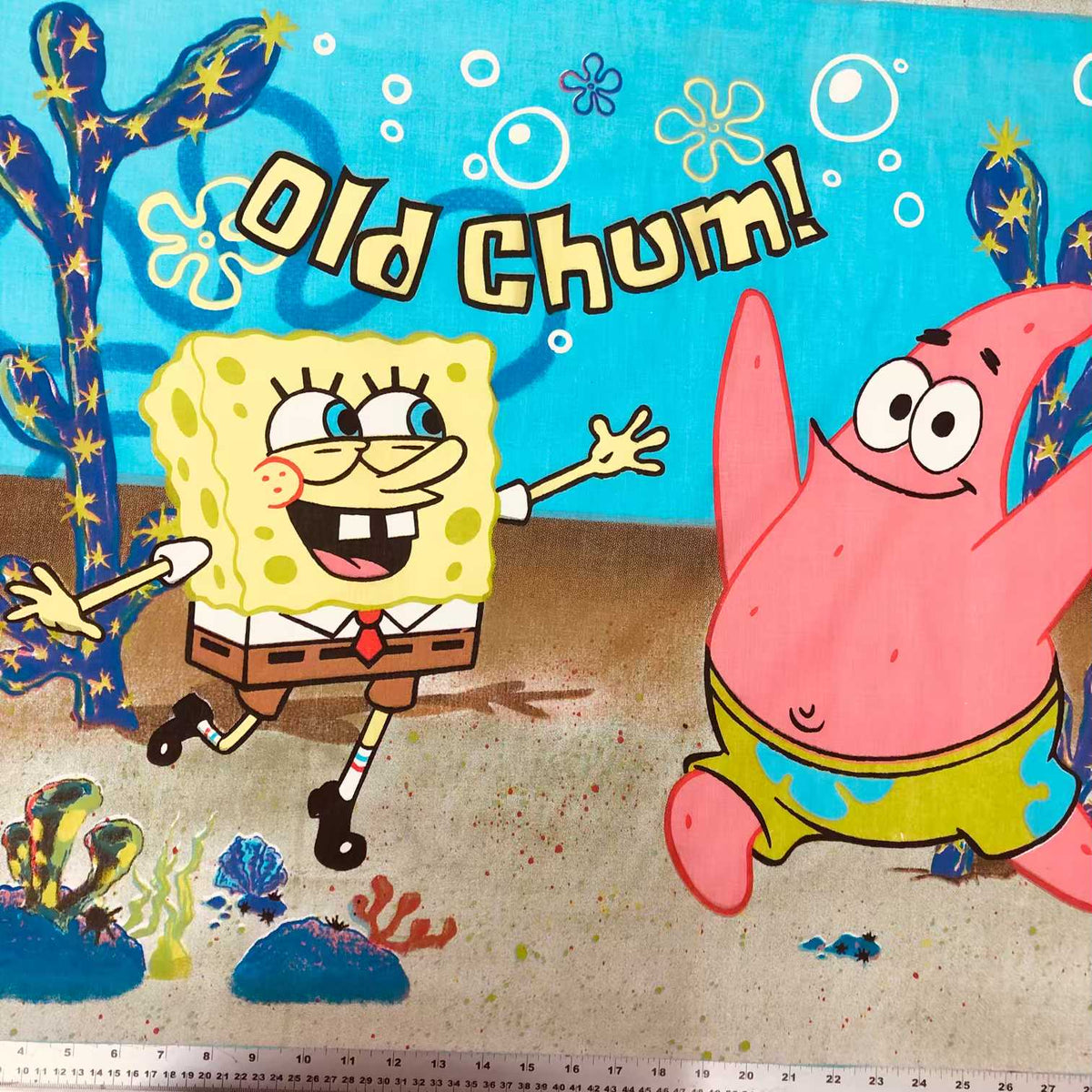 Cotton fabric with SpongeBob and Patrick in a colourful underwater character print