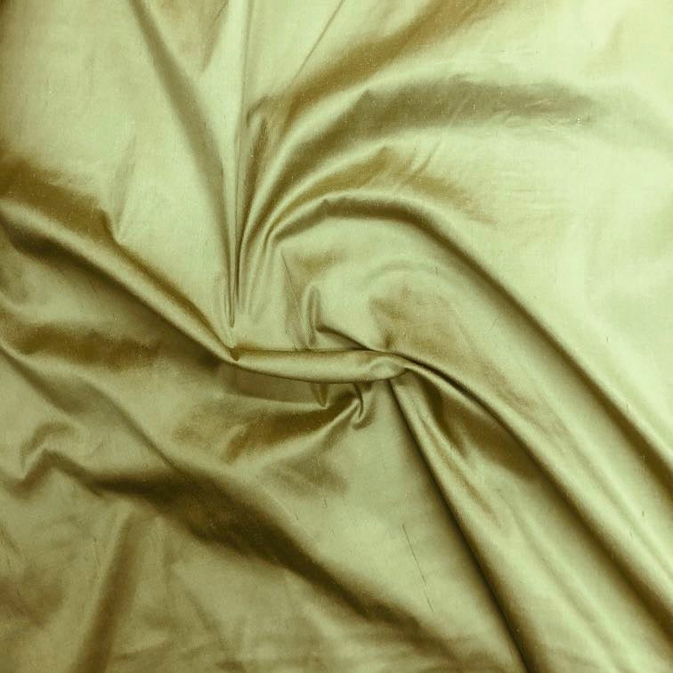 Dupioni silk fabric in eucalyptus green with crisp textured finish