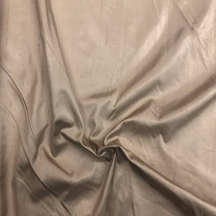 Dupioni silk fabric in light brown with crisp textured finish