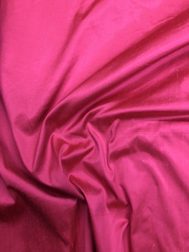Dupioni silk fabric in pink with crisp textured finish