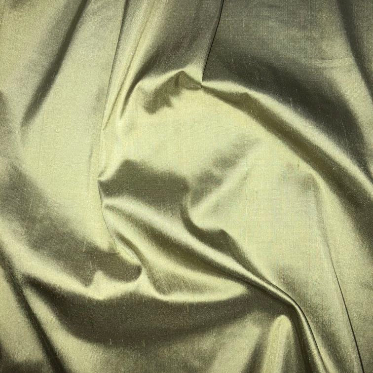 Dupioni silk fabric in aloe green with crisp textured finish