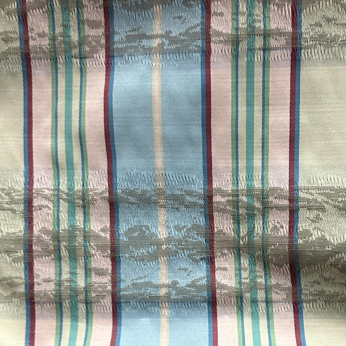 Drapery fabric with a classic plaid and striped line pattern for curtains and home décor