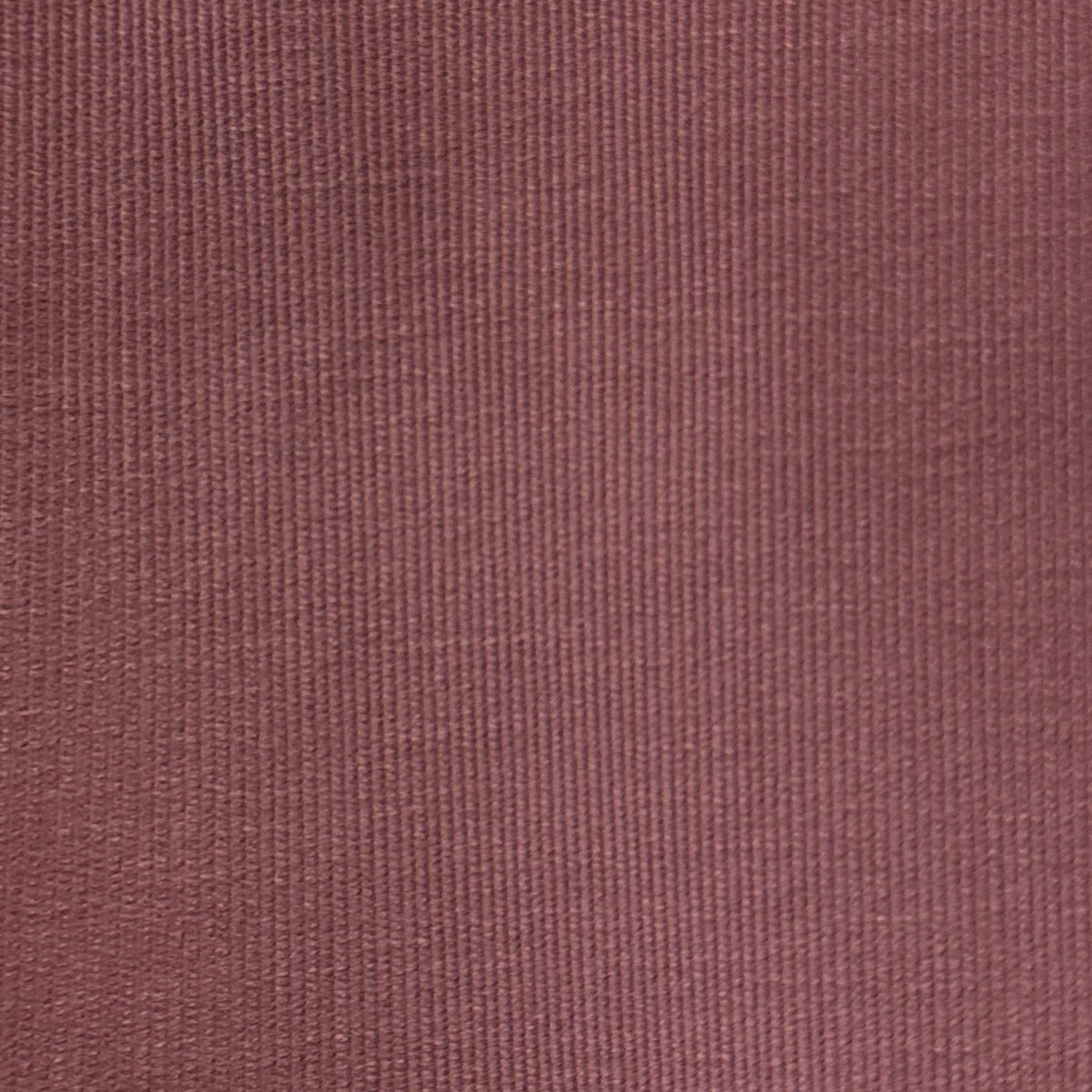 Pink velvet corduroy look-a-like upholstery fabric with textured solid finish