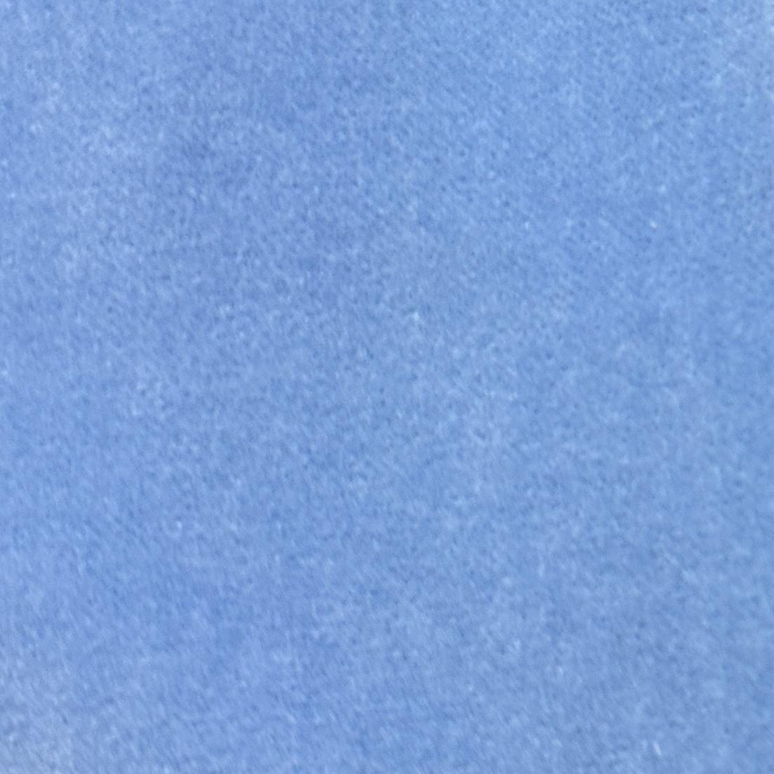 Solid blue velvet upholstery fabric with a soft surface and subtle tonal texture