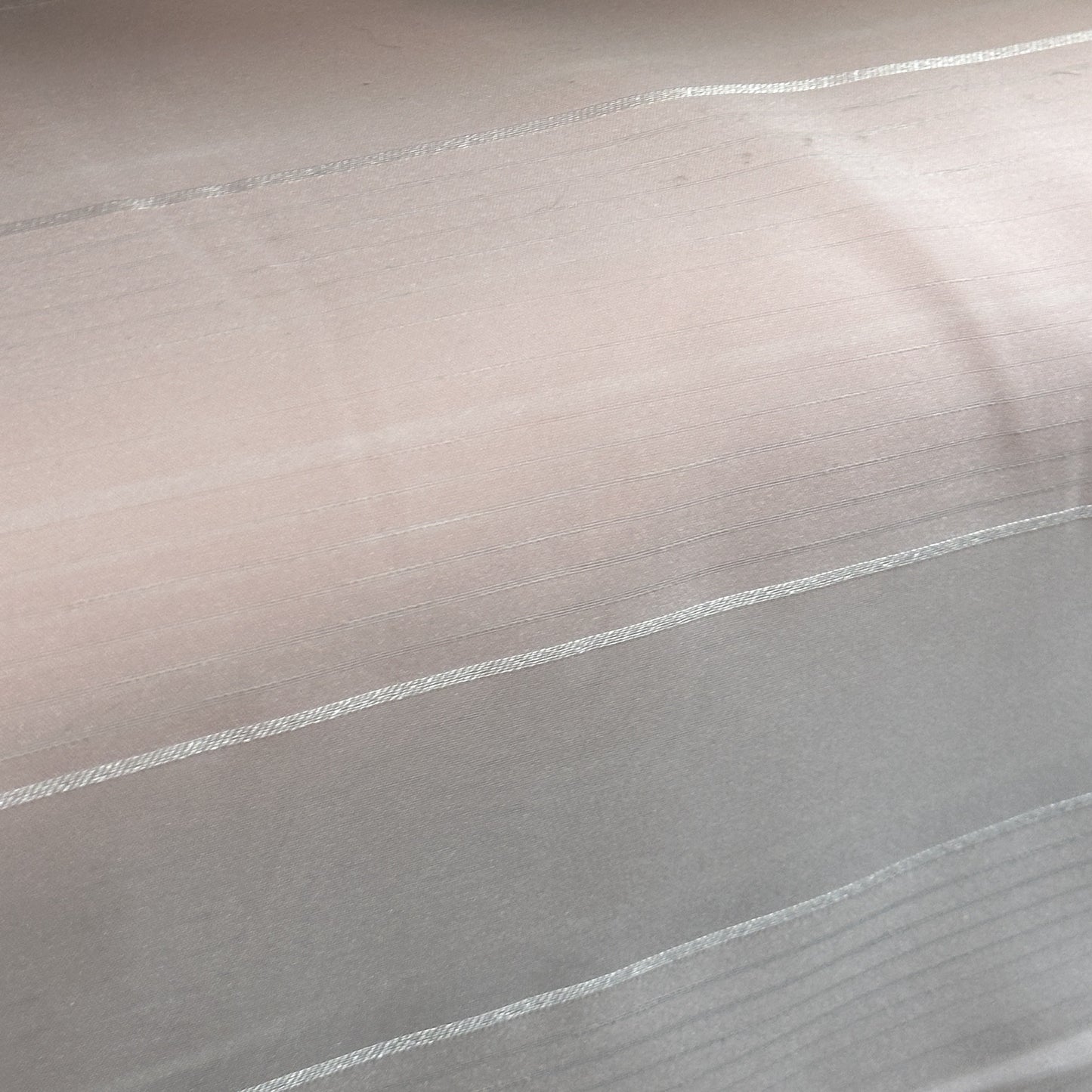 Extra-wide Italian sheer fabric with a lightweight woven texture for drapery