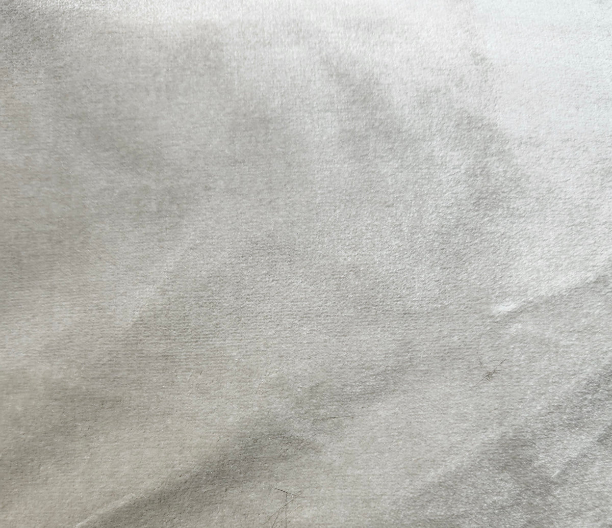 100% silk velvet off-white fabric with a soft plush pile and luxurious smooth finish