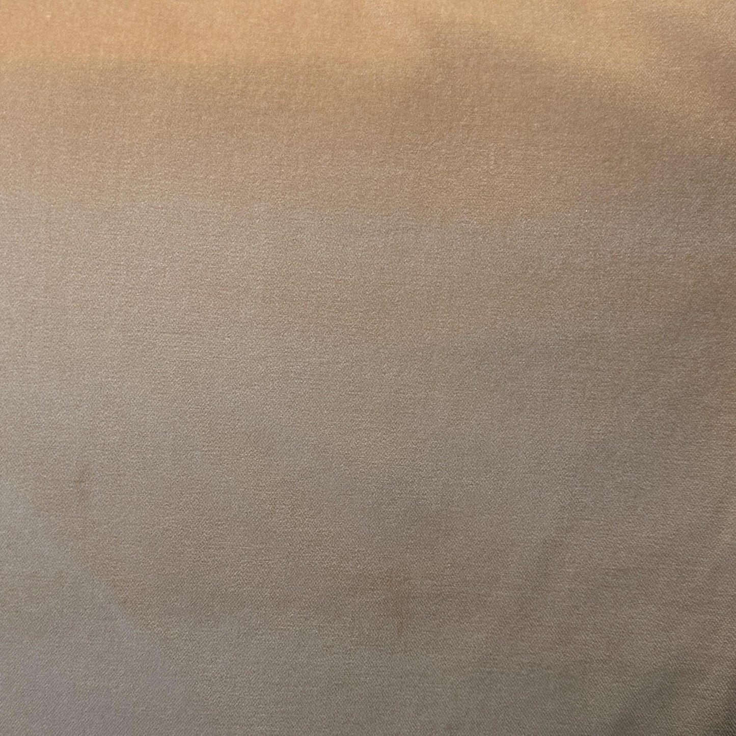Peach upholstery velvet fabric with a soft plush surface for furniture and home décor