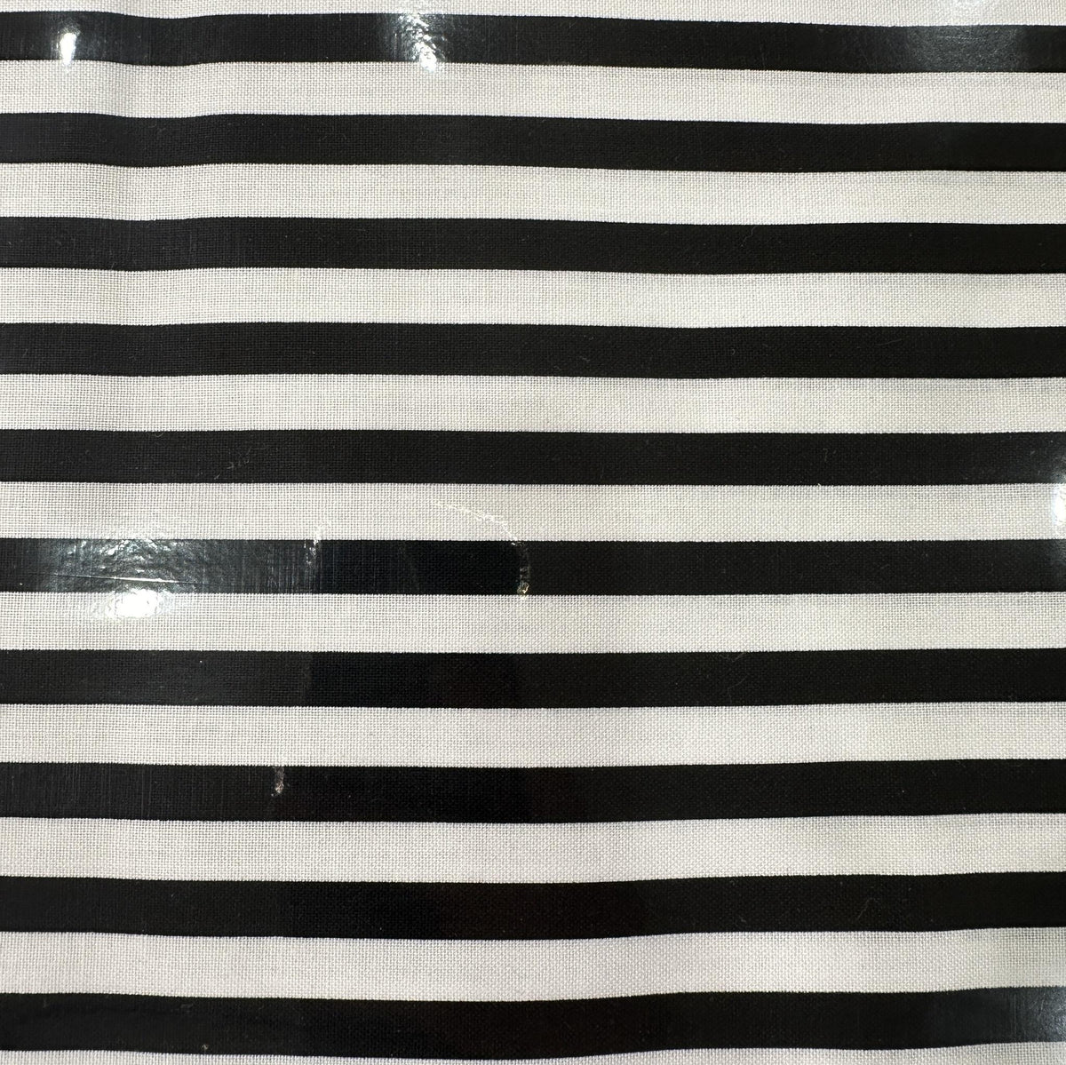 Black and white cotton fabric with bold horizontal stripe pattern