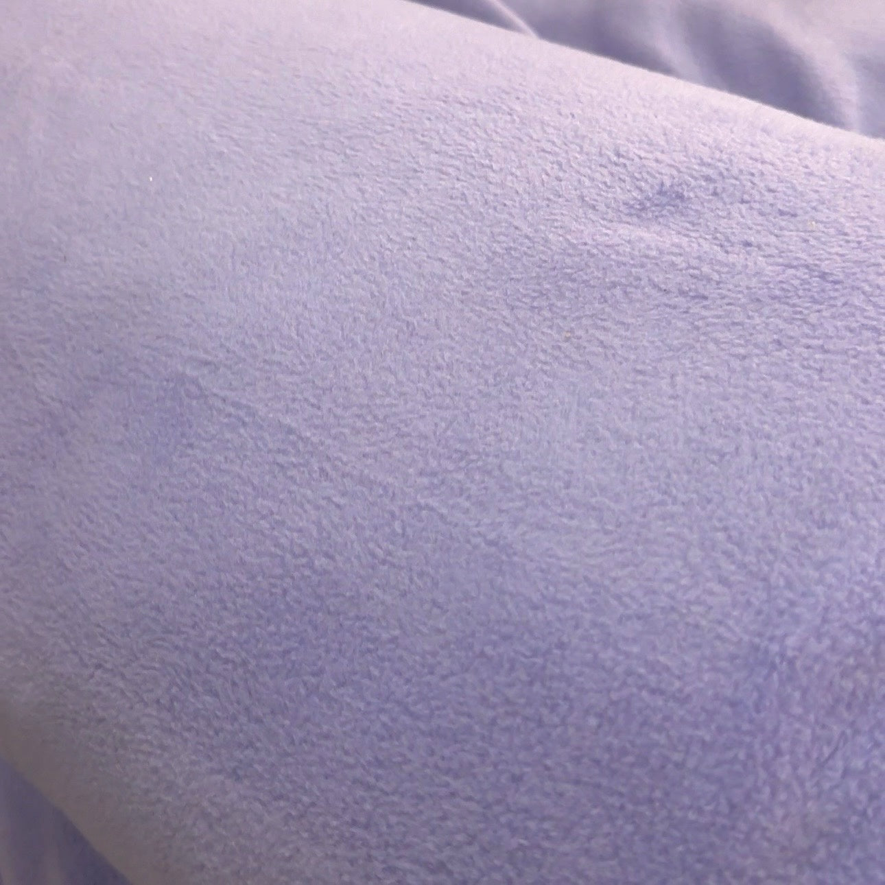 Polyester fleece fabric with a soft brushed finish for blankets, apparel, and crafts