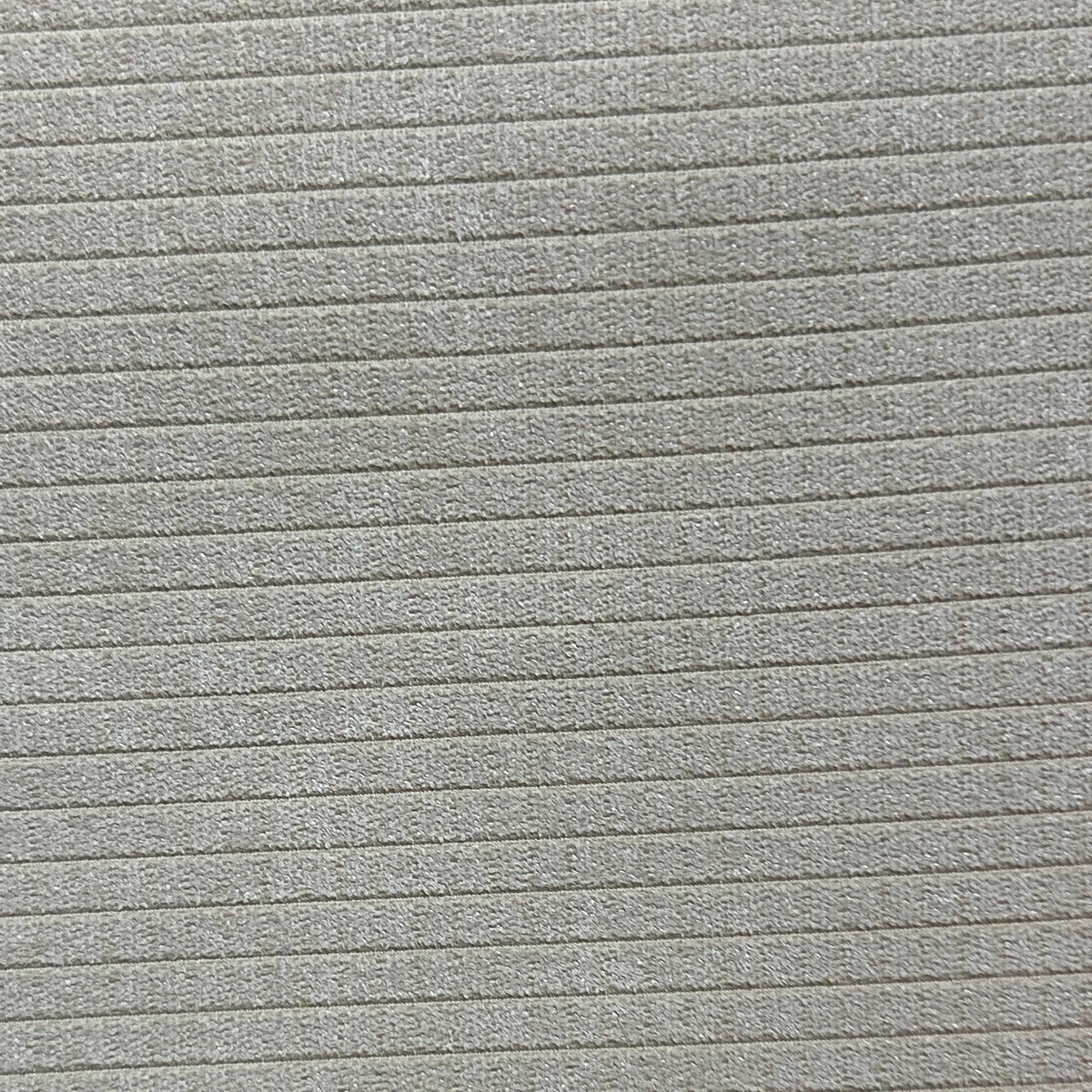 Solid ivory velvet upholstery fabric with a soft, smooth pile and subtle tonal texture