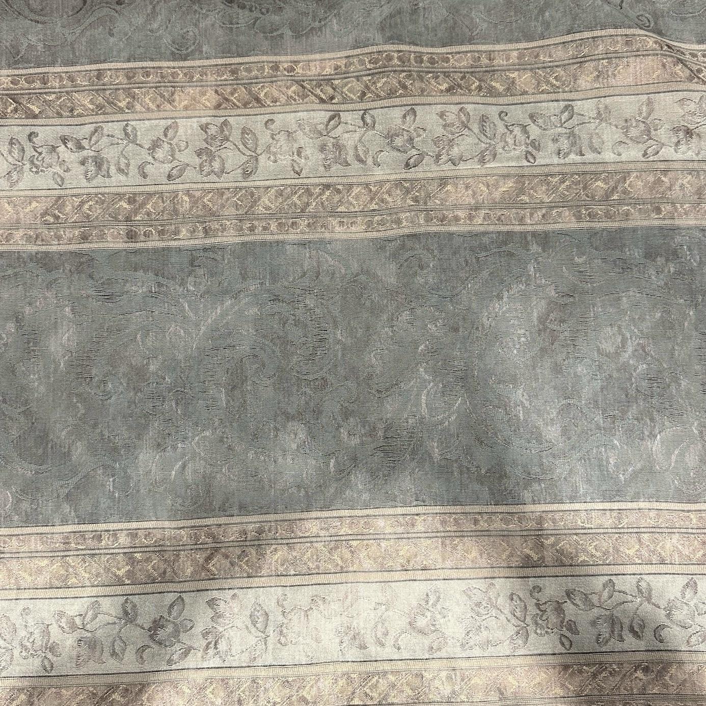 Polyester upholstery fabric with a vintage floral and striped pattern