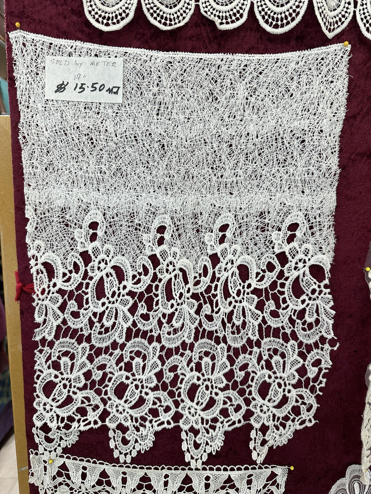 White 17-inch lace trim with wide decorative openwork detailing