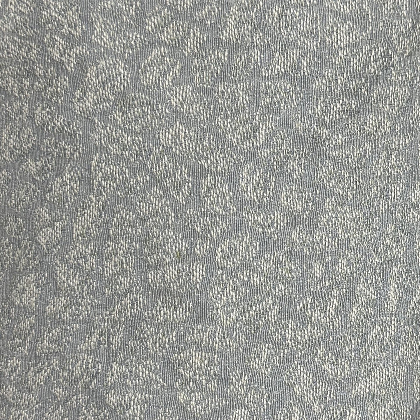 Grey polyester fabric with a subtle basic pattern for upholstery and home décor