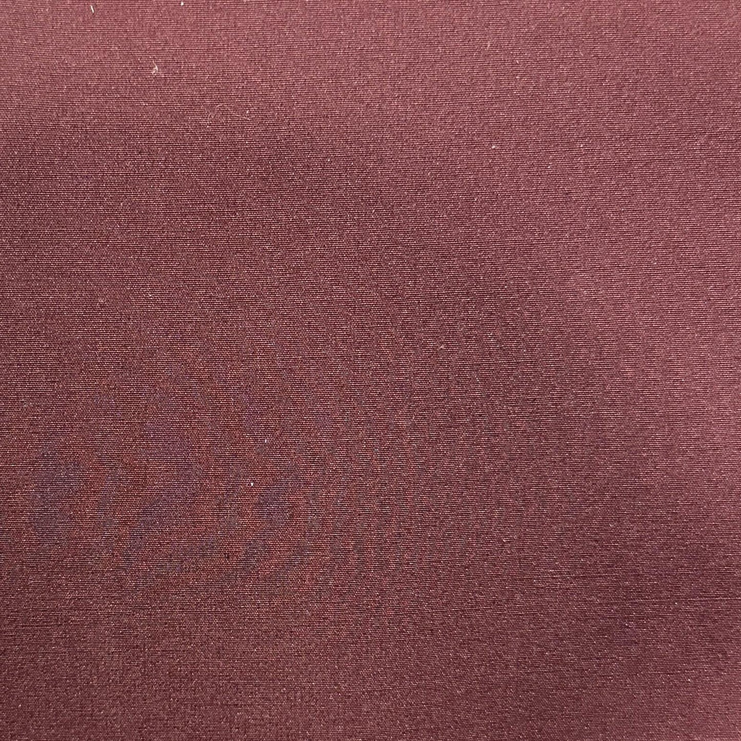 100% waterproof outdoor polyester fabric in burgundy for apparel, crafts and upholstery