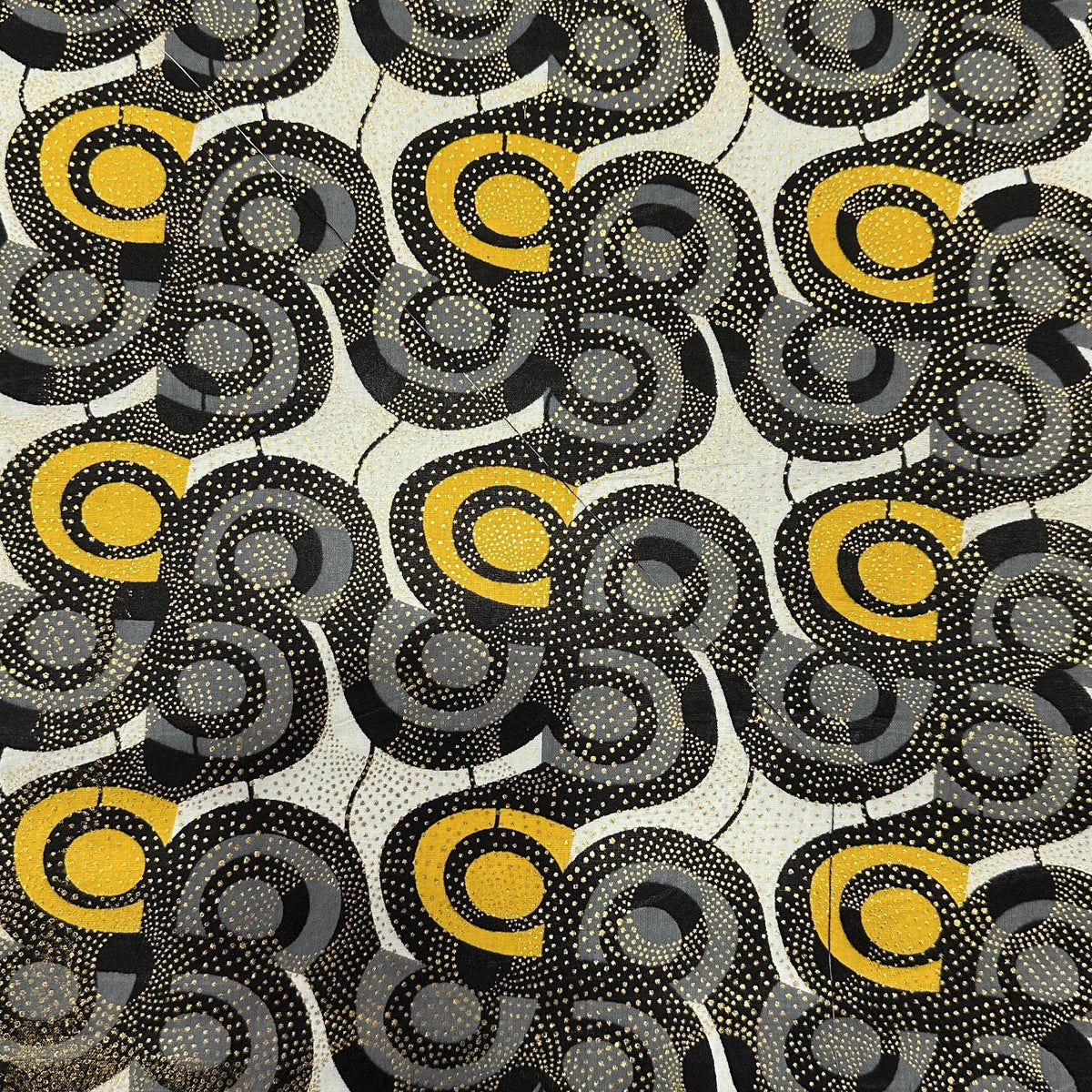 African wax cotton fabric with a colourful repeating waves pattern