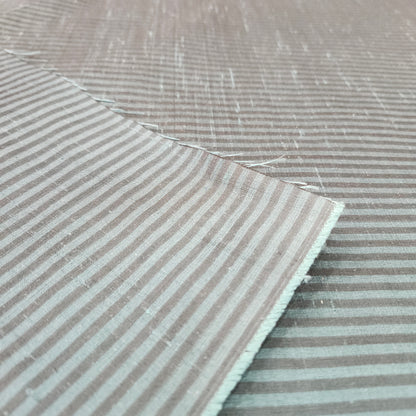 Green and black striped silk fabric with a smooth finish and elegant woven texture
