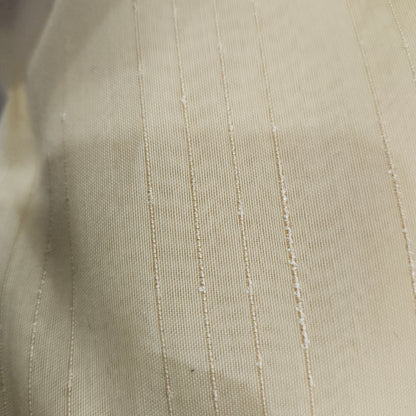 Gold wide-width sheer polyester drapery fabric with a textured finish